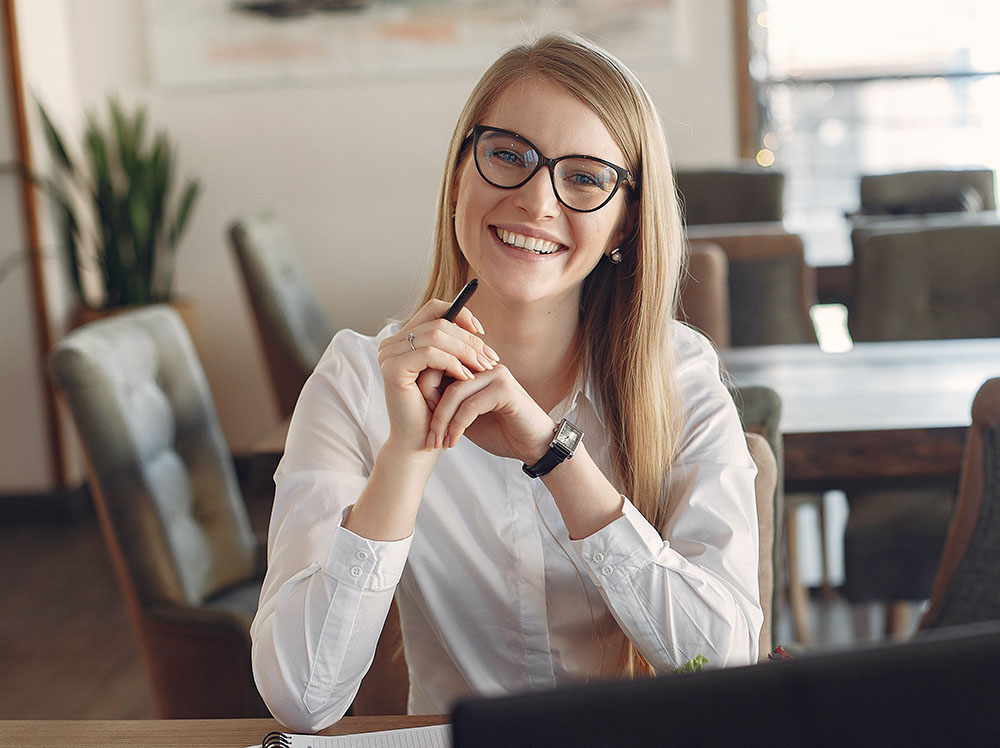 White woman smiling