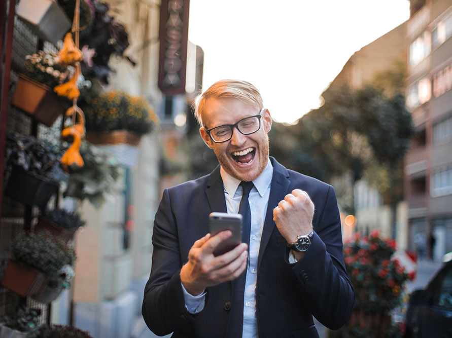 White man happy on phone