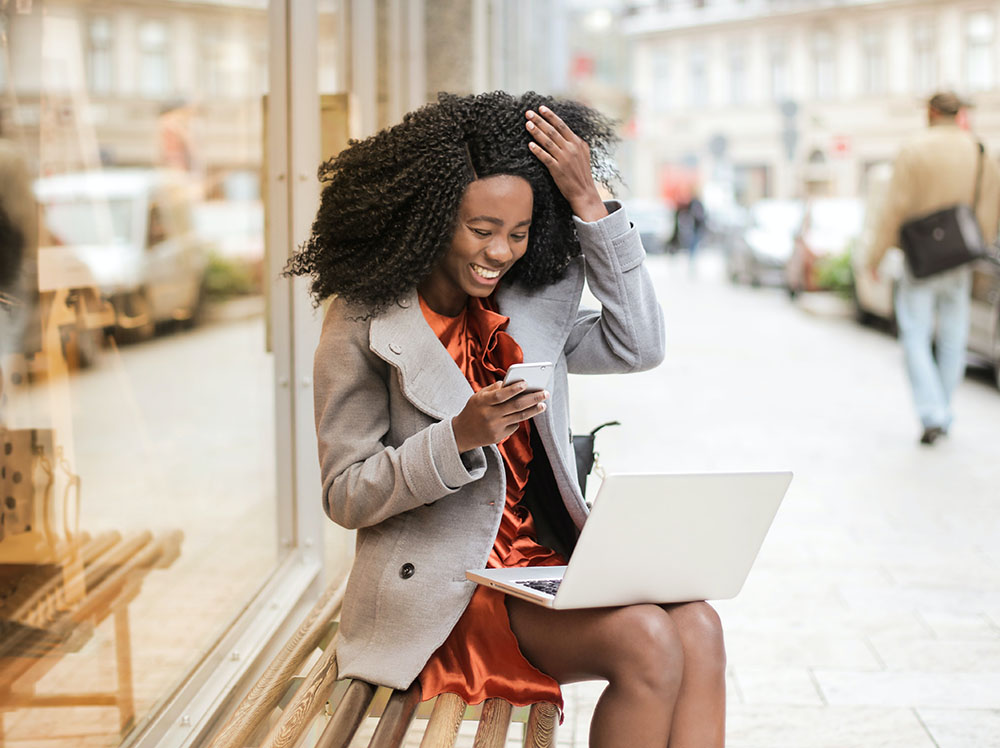 Black woman happy and surprised